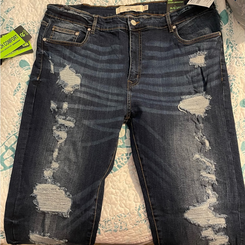 Men’s jeans. Distressed style.